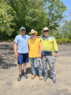 Three men camping.