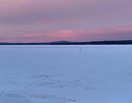 Moosehead Lake at sunset in winter.